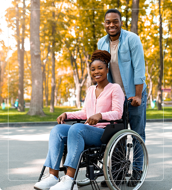 Man and woman in wheelchair